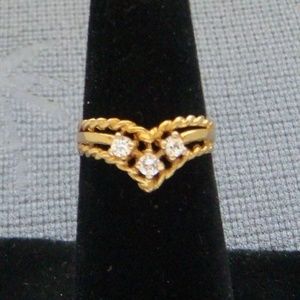 English 9 karat yellow gold .31 carat ring. Size 5